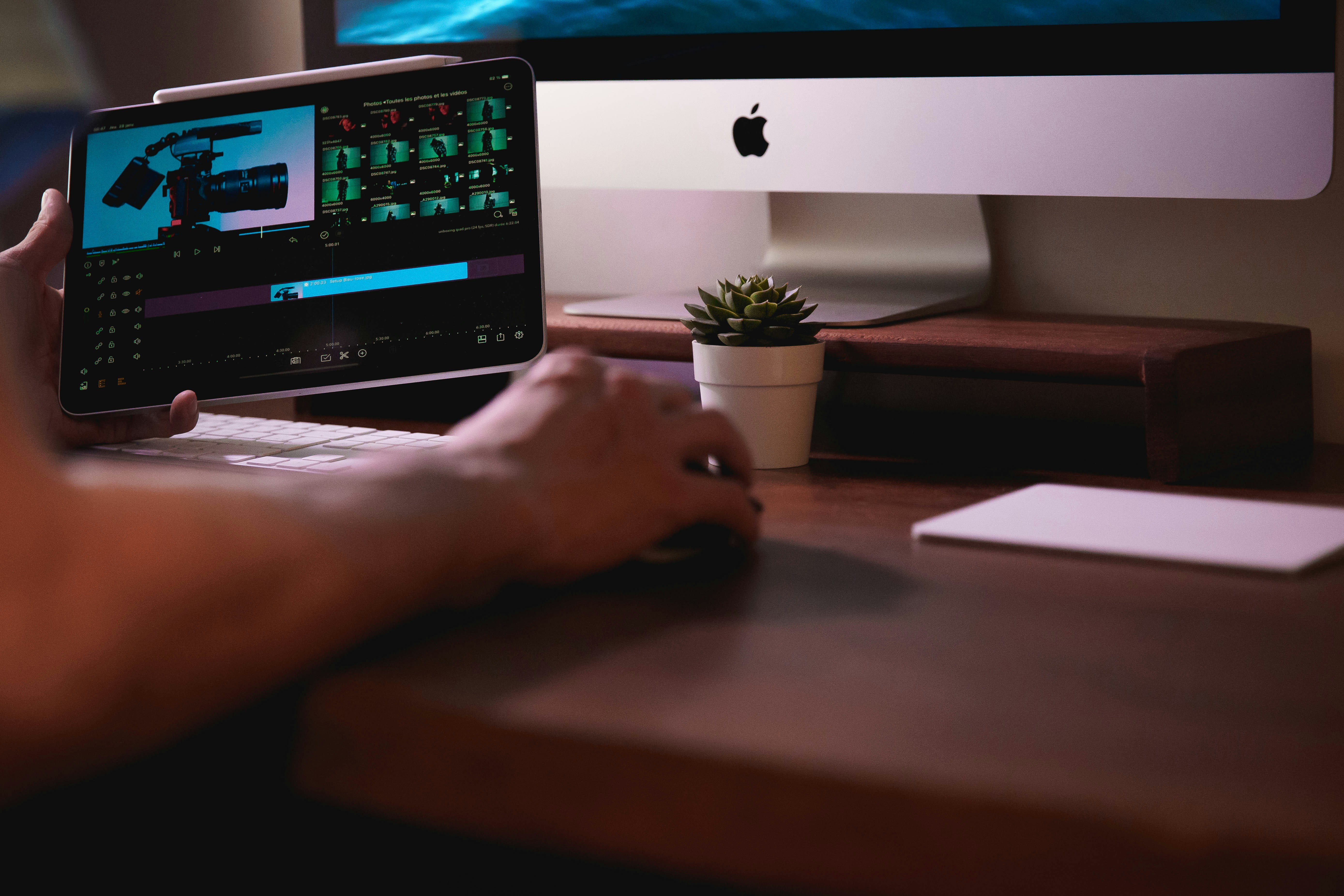 persons hand on computer screen